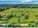 Aerial view of the property, showcasing a mix of open fields and dense forest at 357 Old Driver Rd, Whitesburg, GA 30185