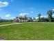 Well-manicured lawn leading up to a beautiful house with ample parking and garage space at 357 Old Driver Rd, Whitesburg, GA 30185