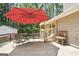 Backyard patio featuring an outdoor seating area, a cat enclosure, and a wash station, perfect for outdoor enjoyment at 8340 Highway 54, Sharpsburg, GA 30277
