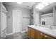 Bathroom boasts double sinks, large mirror, and updated hardware at 8340 Highway 54, Sharpsburg, GA 30277