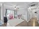 Open living room with stylish decor, seamlessly connecting to other living spaces for easy entertaining at 8340 Highway 54, Sharpsburg, GA 30277