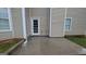 The backyard is highlighted by a small concrete patio area, perfect for relaxing at 705 Mustang Ct, Hampton, GA 30228