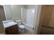 Bathroom featuring a tub, shower, toilet, and sink with contemporary fixtures and a clean design at 705 Mustang Ct, Hampton, GA 30228