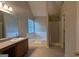 Bathroom with a large soaking tub, a separate shower, and a vanity with countertop space at 705 Mustang Ct, Hampton, GA 30228