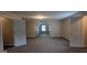 Large bonus room with two doors and window at 705 Mustang Ct, Hampton, GA 30228