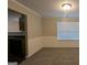 Cozy dining area with wainscotting and a window at 705 Mustang Ct, Hampton, GA 30228