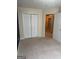 Comfortable bedroom with carpet and large double door closet for storage at 755 Magnolia Gardens Walk, Mcdonough, GA 30253