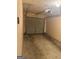View of a one car garage featuring a gray garage door at 755 Magnolia Gardens Walk, Mcdonough, GA 30253