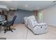 Finished basement includes neutral carpet, recessed lighting, and a gray accent wall with trim at 301 East Highway 5, Roopville, GA 30170