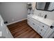 Bathroom showcasing a modern vanity with a white countertop and a rectangular sink at 301 East Highway 5, Roopville, GA 30170
