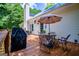 Back deck with outdoor seating, perfect for entertaining and relaxing in the backyard at 301 East Highway 5, Roopville, GA 30170