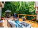 Large deck offering plenty of space for outdoor seating, grilling, and backyard entertaining at 301 East Highway 5, Roopville, GA 30170