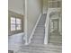 Bright foyer with modern flooring and a staircase leading to the upper level at 1255 Silverstone Trl, Jonesboro, GA 30238