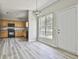 Open concept kitchen featuring wood cabinets at 1255 Silverstone Trl, Jonesboro, GA 30238