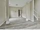 Open living area with modern floors that is well-lit with natural light at 1255 Silverstone Trl, Jonesboro, GA 30238