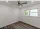 Bedroom featuring neutral paint, great natural light, ceiling fan, and wood-look flooring at 1446 Westmont Sw Rd, Atlanta, GA 30311