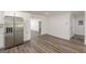 Kitchen with stainless steel refrigerator and hardwood flooring at 1446 Westmont Sw Rd, Atlanta, GA 30311