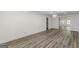 Light filled living room featuring hardwood style floors and neutrally painted walls at 1446 Westmont Sw Rd, Atlanta, GA 30311