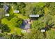 Aerial shot of the property showing home, shed, screened porch, shop, and carport at 2164 Old Rex Morrow Rd, Morrow, GA 30260