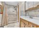 Bathroom showcases a walk-in shower, vanity, neutral tile, and chrome fixtures at 2164 Old Rex Morrow Rd, Morrow, GA 30260