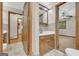 Updated bathroom with classic vanity, tile backsplash, and a walk-in shower at 2164 Old Rex Morrow Rd, Morrow, GA 30260
