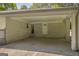 Attached carport providing covered parking and convenient access to the home at 2164 Old Rex Morrow Rd, Morrow, GA 30260