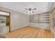 Inviting living room with hardwood floors, built-in shelving, and charming details at 2164 Old Rex Morrow Rd, Morrow, GA 30260