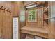 Office/study features custom built-in desk and shelving along with a window to the exterior at 2164 Old Rex Morrow Rd, Morrow, GA 30260