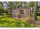 An exterior view of the outbuilding on this property at 2164 Old Rex Morrow Rd, Morrow, GA 30260