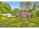 This home features a large outbuilding in addition to the main home on the property at 2164 Old Rex Morrow Rd, Morrow, GA 30260