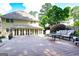 Spacious backyard deck with outdoor seating perfect for relaxing and entertaining at 148 Lakeside Dr, Peachtree City, GA 30269