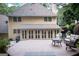 Backyard with spacious deck and outdoor furniture, great for entertaining guests at 148 Lakeside Dr, Peachtree City, GA 30269