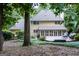Backyard featuring a spacious deck with outdoor seating, perfect for entertaining at 148 Lakeside Dr, Peachtree City, GA 30269