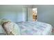 Comfortable bedroom with quilt, closet and hallway views at 148 Lakeside Dr, Peachtree City, GA 30269