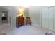 Comfortable bedroom with closet and classic wood dresser at 148 Lakeside Dr, Peachtree City, GA 30269