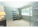 Bedroom featuring a neutral walls, carpet and an assortment of shelving units at 148 Lakeside Dr, Peachtree City, GA 30269