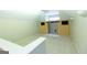 Bright bedroom featuring built-in cabinetry and neutral carpet at 148 Lakeside Dr, Peachtree City, GA 30269