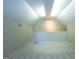 Bright hallway featuring neutral paint, trim and carpeting at 148 Lakeside Dr, Peachtree City, GA 30269