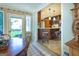 Breakfast bar leading to open kitchen at 148 Lakeside Dr, Peachtree City, GA 30269