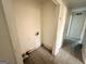 A simple laundry room space awaits upgrades and personalization to maximize functionality at 10103 Allen Sw Dr, Covington, GA 30014