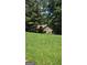 Spacious backyard with well-maintained grass, perfect for outdoor activities at 1448 Se Hillside Place, Conyers, GA 30094