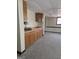 Spacious carpeted basement with ample cabinet storage and a classic design at 1448 Se Hillside Place, Conyers, GA 30094