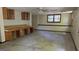 Large basement space enhanced by generous natural lighting and custom cabinetry at 1448 Se Hillside Place, Conyers, GA 30094