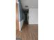 Open view of the hallway, connecting rooms with neutral paint colors at 1448 Se Hillside Place, Conyers, GA 30094