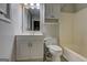 Bathroom featuring a vanity with storage, mirror, toilet, and shower at 3681 Chestnut Lake Ct, Jonesboro, GA 30236