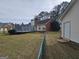 Spacious backyard featuring a deck and a chain-link fence that adds a charming outdoor living space at 164 Turner Creek Dr, Hampton, GA 30228