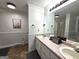Bathroom features a shower, sink, bathtub, and pink and white decor and large mirror at 164 Turner Creek Dr, Hampton, GA 30228