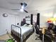 Neutrally decorated bedroom with carpet, closet, ceiling fan and desk is well-suited for a teenager at 164 Turner Creek Dr, Hampton, GA 30228