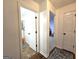 Hallway view into the bathroom and other rooms of the home at 164 Turner Creek Dr, Hampton, GA 30228