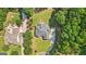 Aerial view of the backyard with a lovely wooden deck area at 320 Silverbell Ln, Sharpsburg, GA 30277